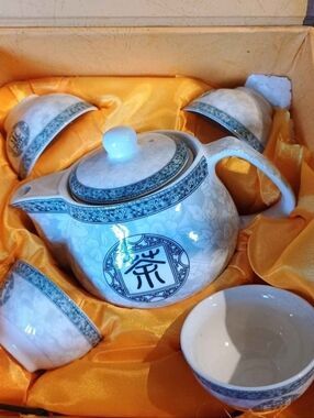 Blue and White Porcelain Tea Set with Chinese Motif And Strainer